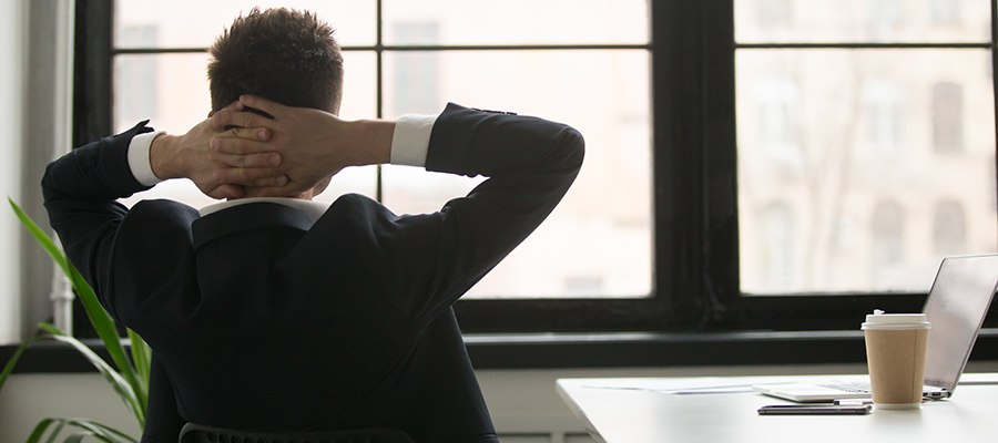 A person stepping away from a desk for a short workday break